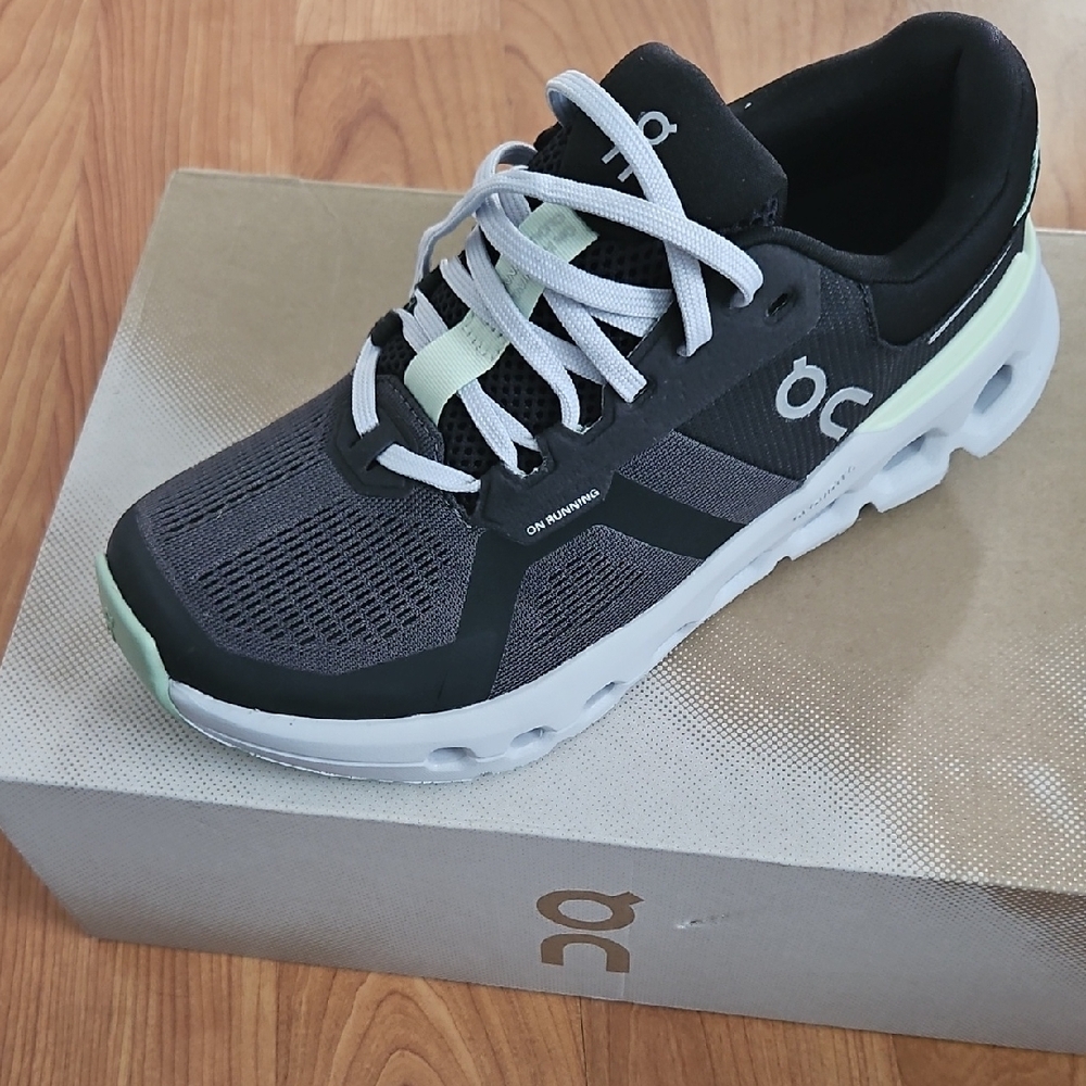 On Running Black and Mint Sneakers